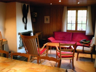 Salon avec coin repas - Maison de vacances Gürütsch