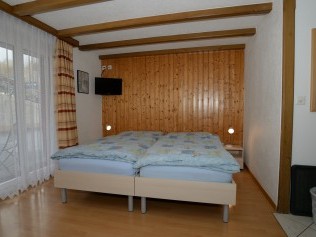 Wohn- und Schlafzimmer - Ferienhaus Juliana