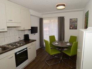 Küche mit Essbereich - Ferienhaus Juliana