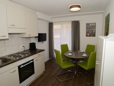 Küche mit Essbereich - Ferienhaus Juliana