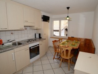 Küche mit Essbereich - Ferienhaus Juliana