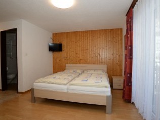 Wohn- und Schlafzimmer - Ferienhaus Juliana