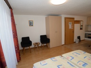 Wohn- und Schlafzimmer - Ferienhaus Juliana