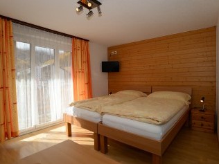 Wohn- und Schlafzimmer - Ferienhaus Juliana