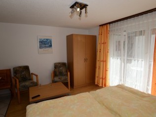 Wohn- und Schlafzimmer - Ferienhaus Juliana