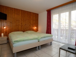 Wohn- und Schlafzimmer - Ferienhaus Juliana