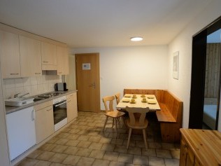 Küche mit Essbereich - Ferienhaus Juliana