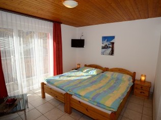 Wohn- und Schlafzimmer - Ferienhaus Juliana