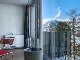Salon avec vue sur le Cervin - Maison de vacances legendär