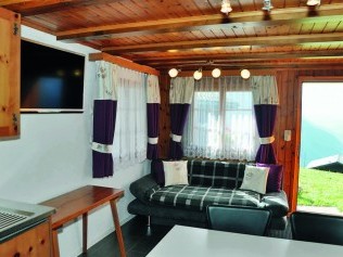 Wohnzimmer - Ferienhaus Lindy