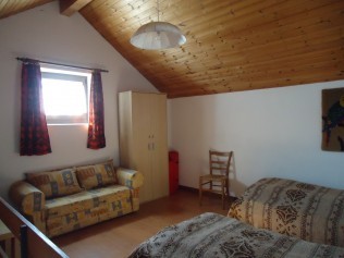 Schlafzimmer - Ferienhaus Rustico Diego Braghetta