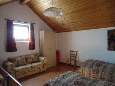 Schlafzimmer - Ferienhaus Rustico Diego Braghetta