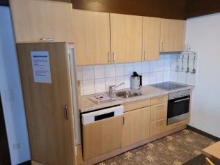 Küche mit Wohnzimmer - Ferienhaus Schlössli