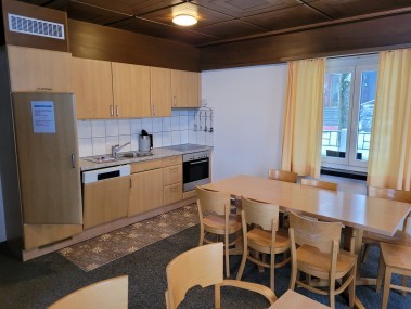 Küche mit Wohnzimmer - Ferienhaus Schlössli