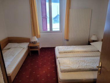 Schlafzimmer - Ferienhaus Schlössli