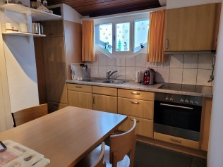 Küche mit Essbereich - Ferienhaus Schlössli