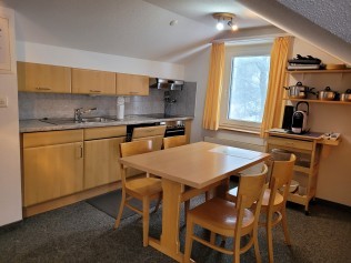 Küche mit Essbereich - Ferienhaus Schlössli