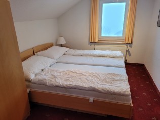 Schlafzimmer - Ferienhaus Schlössli