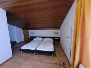 Schlafzimmer - Ferienhaus Schlössli
