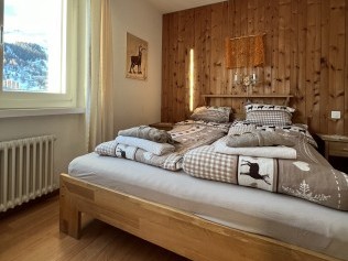 Schlafzimmer - Ferienhaus Uf'm Büel