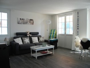 Wohnzimmer mit Essbereich - Ferienpark Alpine Village