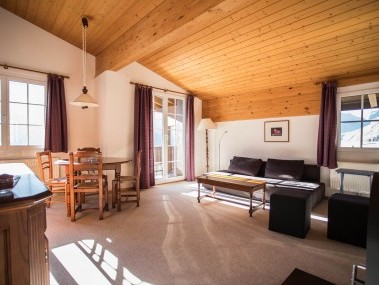 Wohnzimmer mit Essbereich - Ferienpark Alpine Village