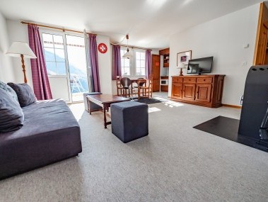 Wohnzimmer mit Essbereich - Ferienpark Alpine Village