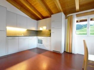 Küche - Ferienresidenz Surses Alpin