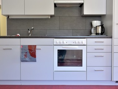 Küche - Ferienresidenz Surses Alpin