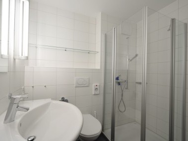 Badzimmer - Ferienresidenz Surses Alpin