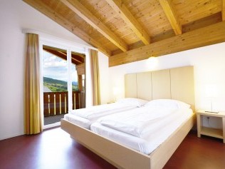 Schlafzimmer - Ferienresidenz Surses Alpin