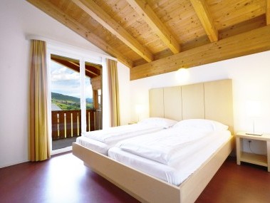Schlafzimmer - Ferienresidenz Surses Alpin