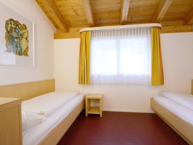 Schlafzimmer - Ferienresidenz Surses Alpin