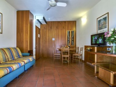 Living room with dining area - Riva degli Etruschi