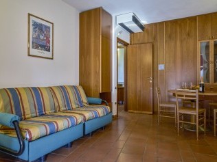 Wohnzimmer mit Essbereich - Riva degli Etruschi