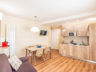 Wohnzimmer mit Essbereich - Riva degli Etruschi