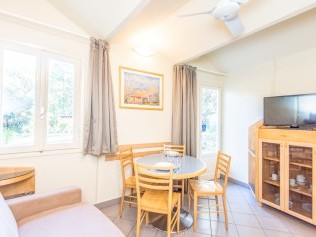 Wohnzimmer mit Essbereich - Riva degli Etruschi