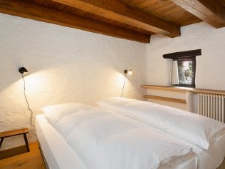 Schlafzimmer - Feriensiedlung Rustici della Verzasca