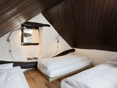 Schlafzimmer - Feriensiedlung Rustici della Verzasca