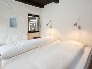 Schlafzimmer - Feriensiedlung Rustici della Verzasca