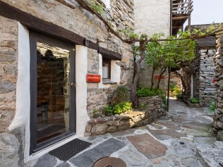 Aussenansicht der Ferienwohnungen - Feriensiedlung Rustici della Verzasca