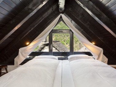 Schlafzimmer - Feriensiedlung Rustici della Verzasca