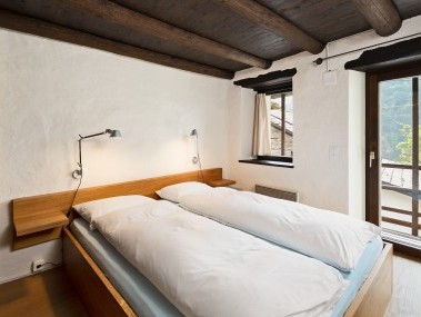 Schlafzimmer - Feriensiedlung Rustici della Verzasca