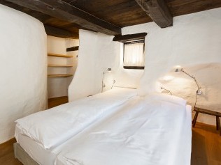 Schlafzimmer - Feriensiedlung Rustici della Verzasca