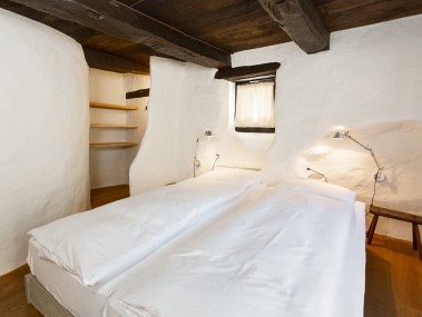 Schlafzimmer - Feriensiedlung Rustici della Verzasca
