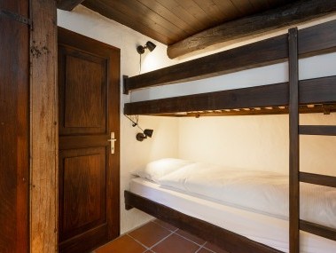 Schlafzimmer - Feriensiedlung Rustici della Verzasca