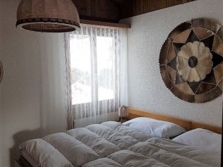 Schlafzimmer - Feriensiedlung Stockenmatt