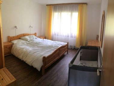 Schlafzimmer - Feriensiedlung Stockenmatt