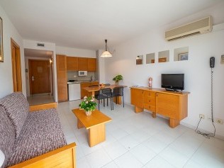 Salon avec coin repas - Golf Beach Residence