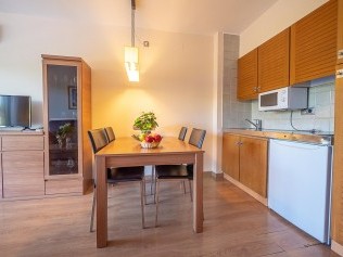 Salon avec coin repas - Golf Beach Residence